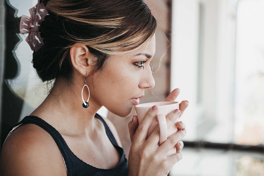 woman drinking tea, stevia, organic gardening, herbs, green living supply